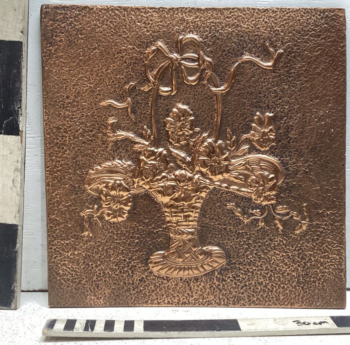 Copper plate of basket with flowers