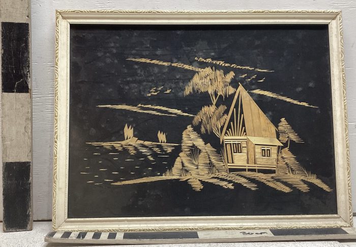 Wooden collage of villa on beach
