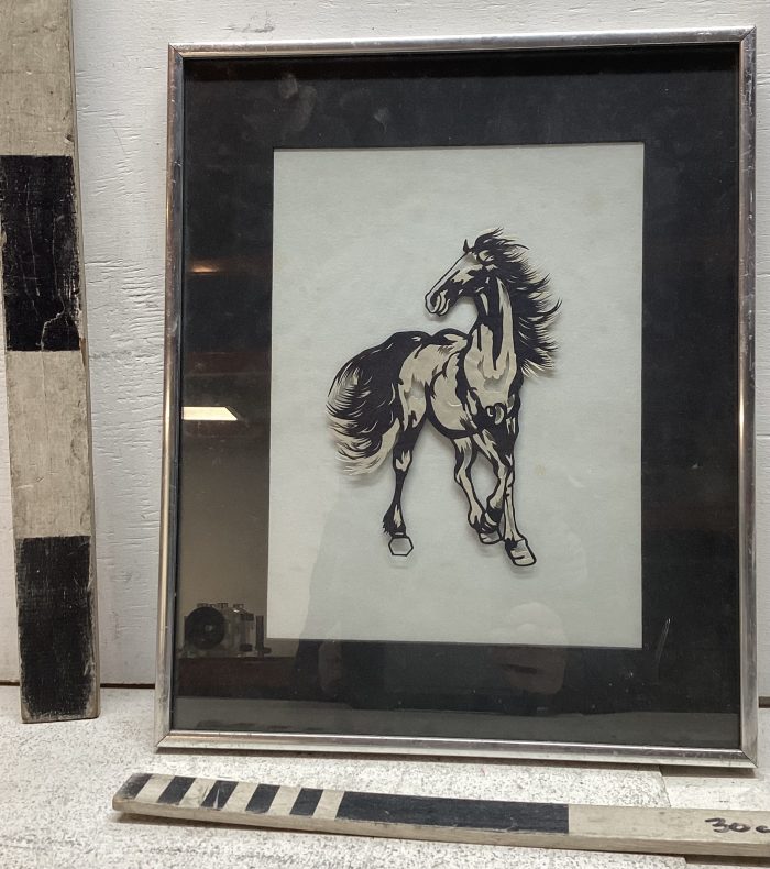 Silhouette print of horse