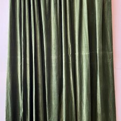 Heavy green velvet drapes